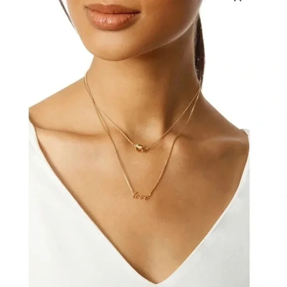 KATE SPADE • Gold Like A Charm Love Knot Double Layer Necklace - Picture 3 of 4
